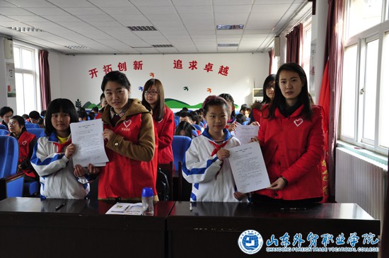 g我院志愿者参加李沧区“学雷锋迎世园”学业帮扶1 1计划启动仪式2.jpg